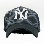 CAGED IN HAT